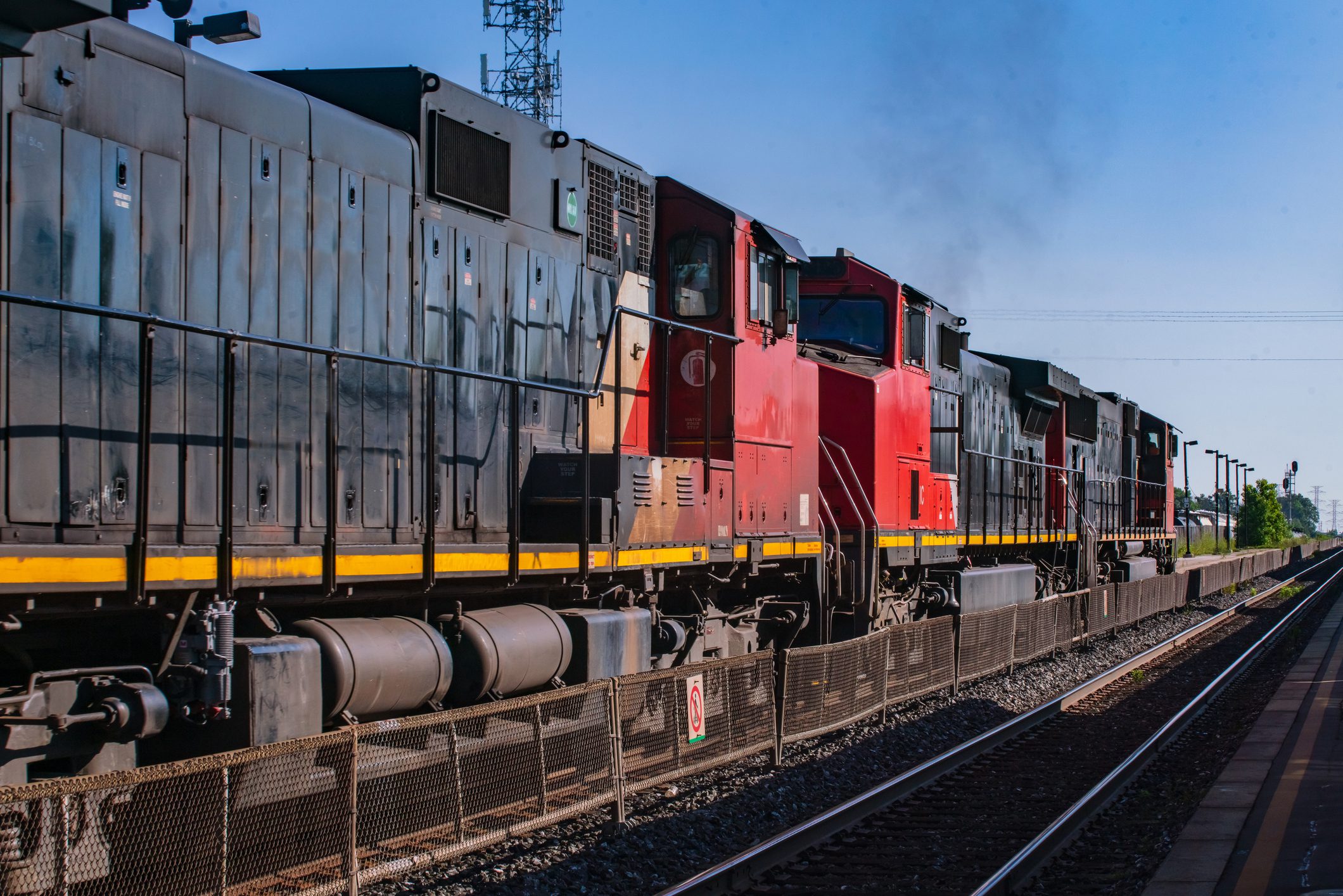 Two Red and Black Freight Train Hauling Cargo Railroad Recruiters