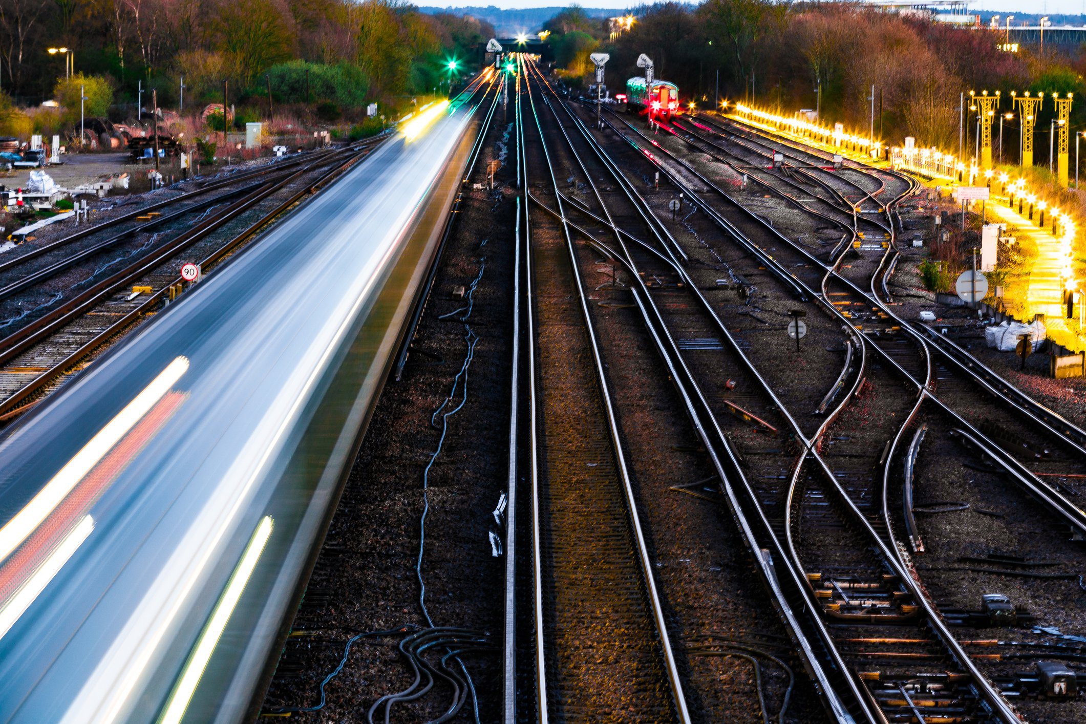 Blurred motion of passenger train in early evening AAR June Rail Industry Overview